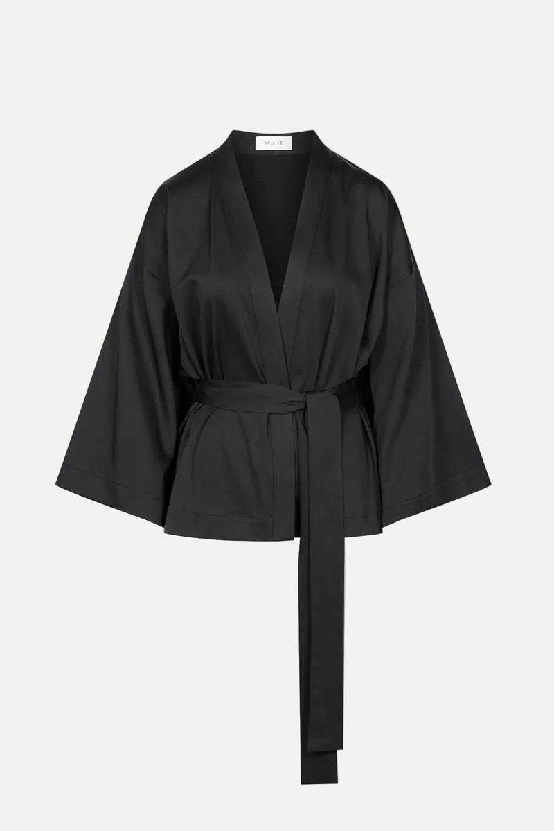 Black robe with a belt on a white background