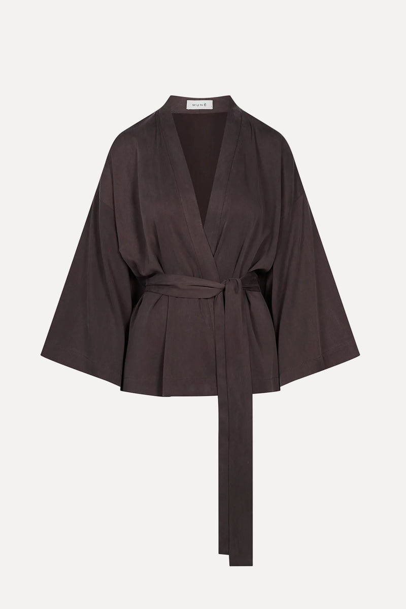 Brown kimono top with a belt on a white background